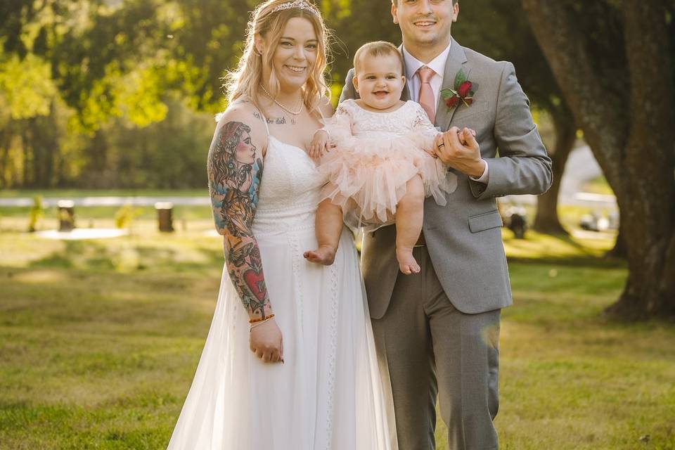 Bride, Groom, and Flower Girl