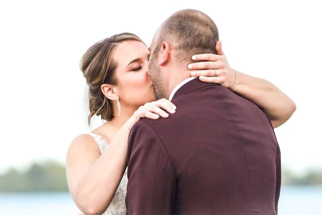 Bride and groom first kiss