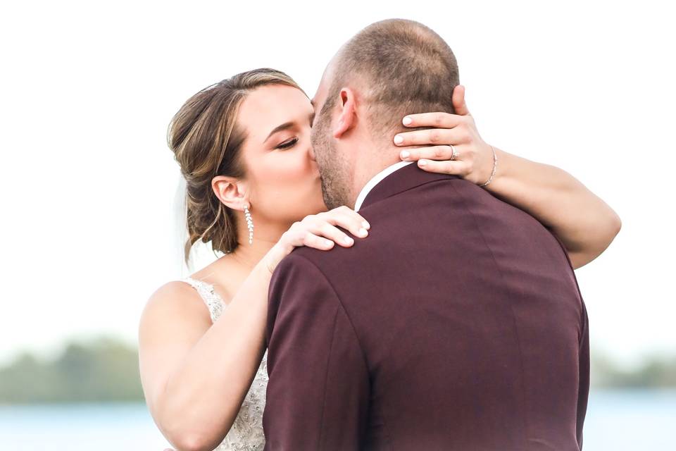 Bride and groom first kiss