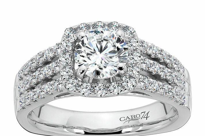 Caro74 Triple Row Designer Engagement Ring with Round Brilliant Center Set in Cushion Shaped Halo
Style # CR480
Available in Platinum or White, Yellow, or Rose Gold
Can be built for any size or shape center stone.