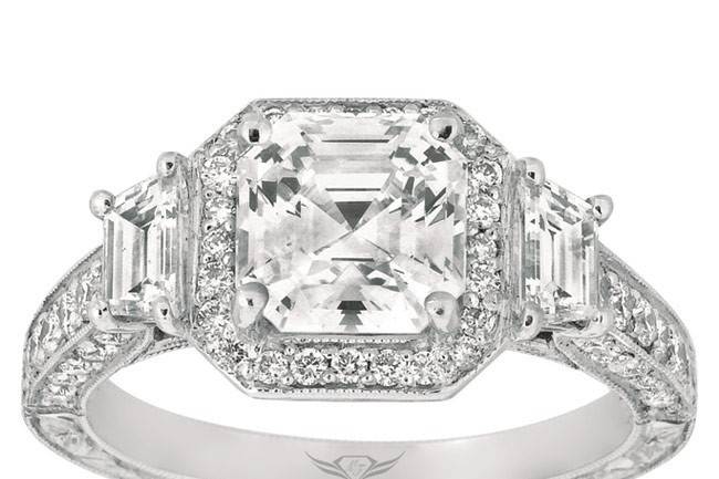 Martin Flyer Designer Three Stone Engagement Ring with Milgrain Edges, Hand Engraving, and Asscher Cut Center
Style # V5265
Available in Platinum or White, Yellow, or Rose Gold
Can be built for any size or shape center stone.