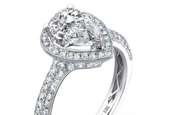 Sylvie Collection Three-Sided Halo Style Designer Engagement Ring with Pear Shaped Center
Style # SY906
Available in Platinum or White, Yellow, or Rose Gold
Can be built for any size or shape center stone.