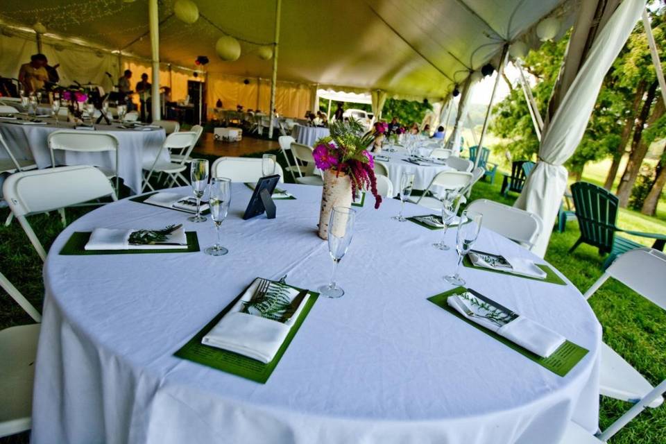 Wedding reception in one of Celebration rentals tent. Celebration Rentals is headquartered in Brandon.