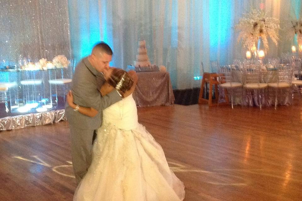 Groom kissing his bride