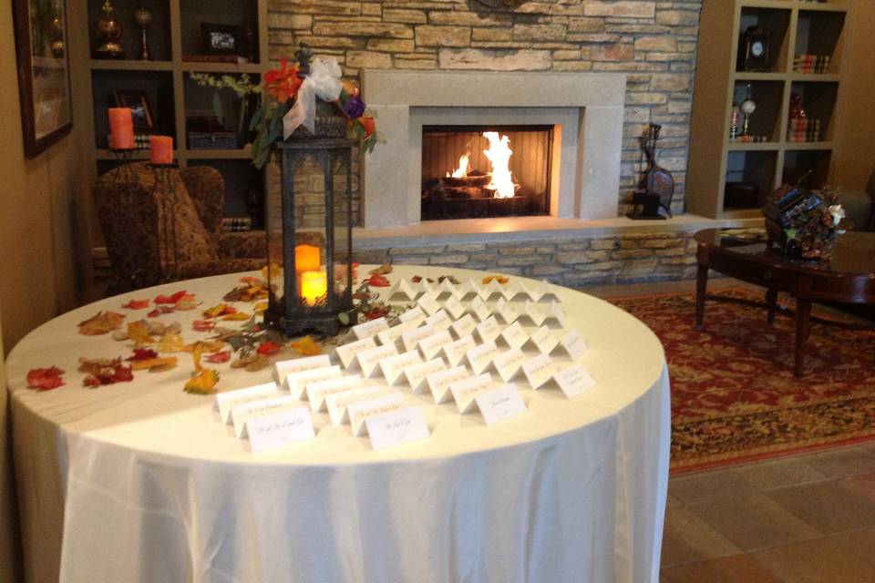 fall wedding place card table at entrance