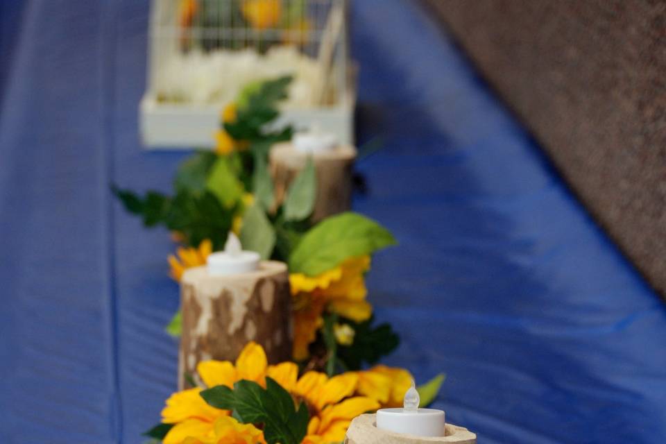 Sunflowers with wood candles