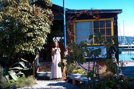 Bride-to-be poses in front of Butterflute's Wedding Chapel