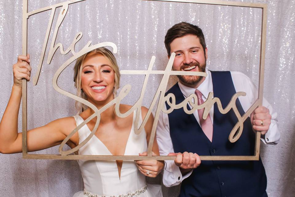 Bride and Groom in Photo Booth