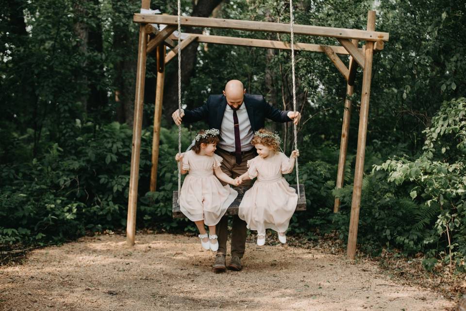 Flower girls and father