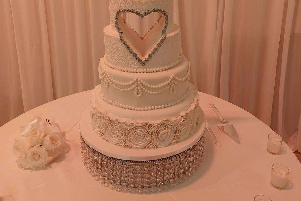 Heart and flowers wedding cake