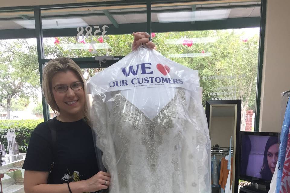 Happy customers with their gowns-that we just cleaned.  Thank you for your comments on Google
