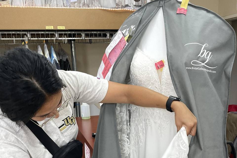 Bride checking out the gown