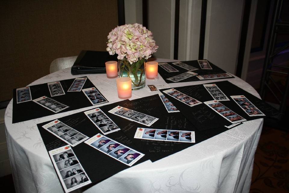 Table of guestbook photos