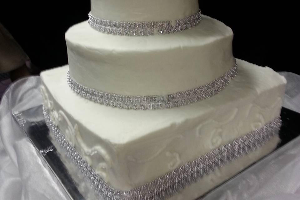 Unique round & square wedding cake with simple bling!
