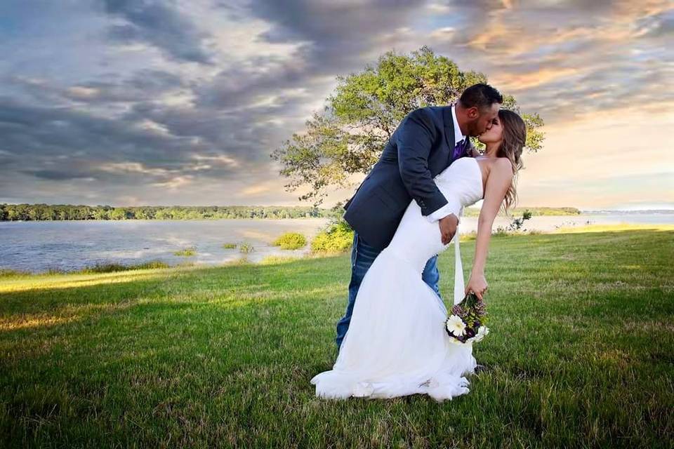 Groom kissing his bride