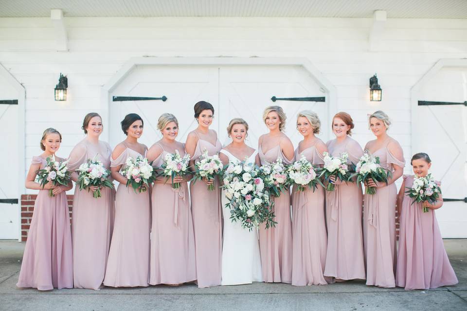 Pose with bridesmaids