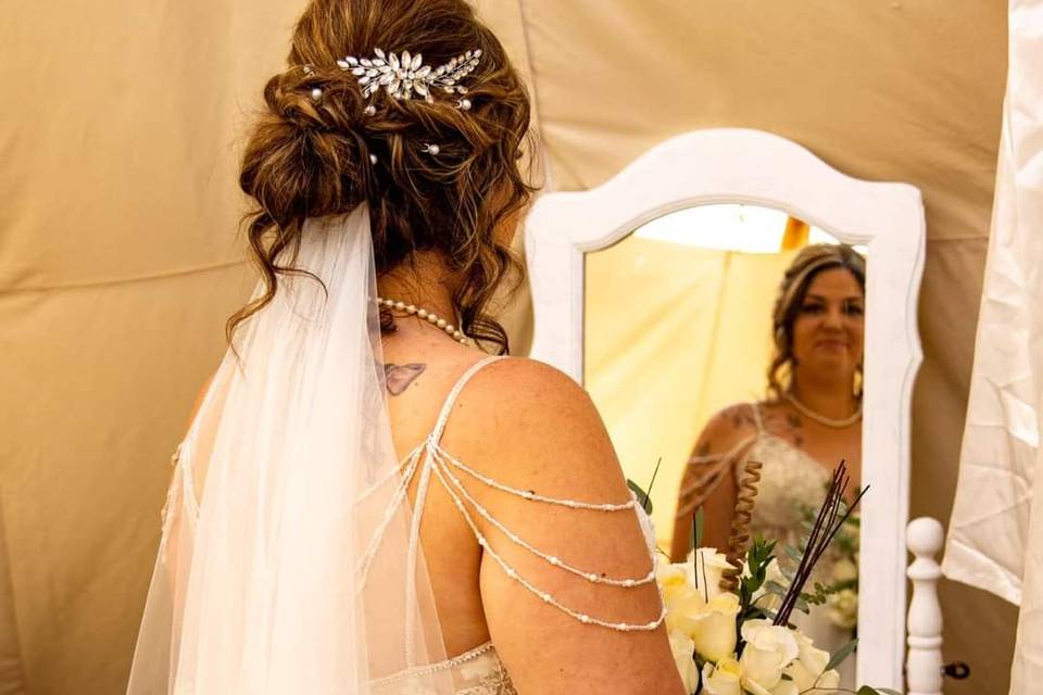 Updo with headpiece and veil