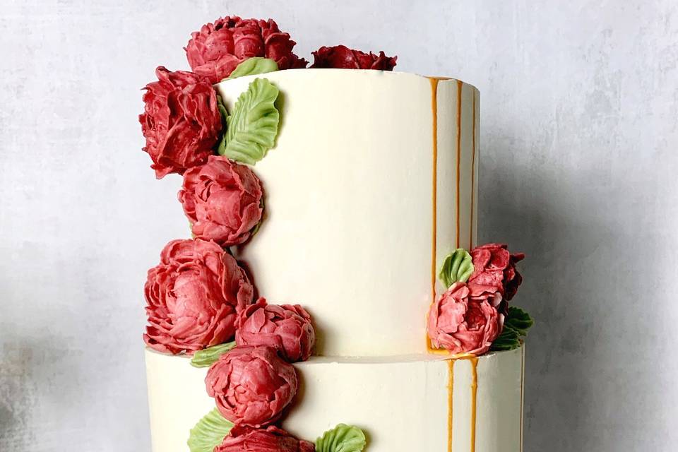 Wedding cake with red flowers