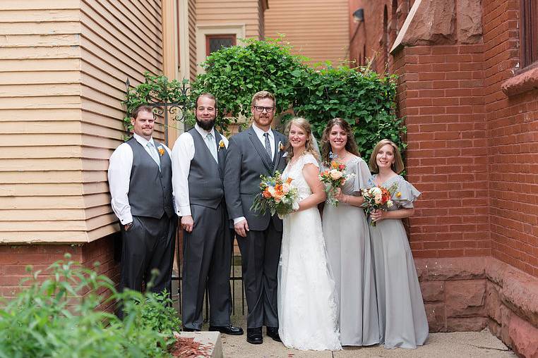 The couple with the bridesmaids and groomsmen