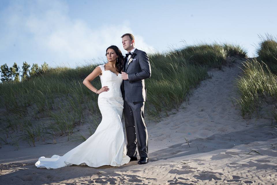 Newlyweds by the sand