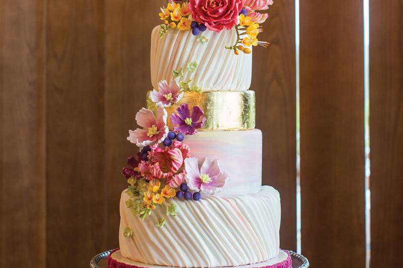 White wedding cake with floral decors