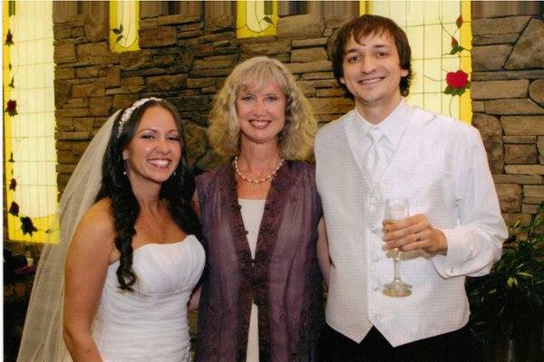 Couple with the officiant