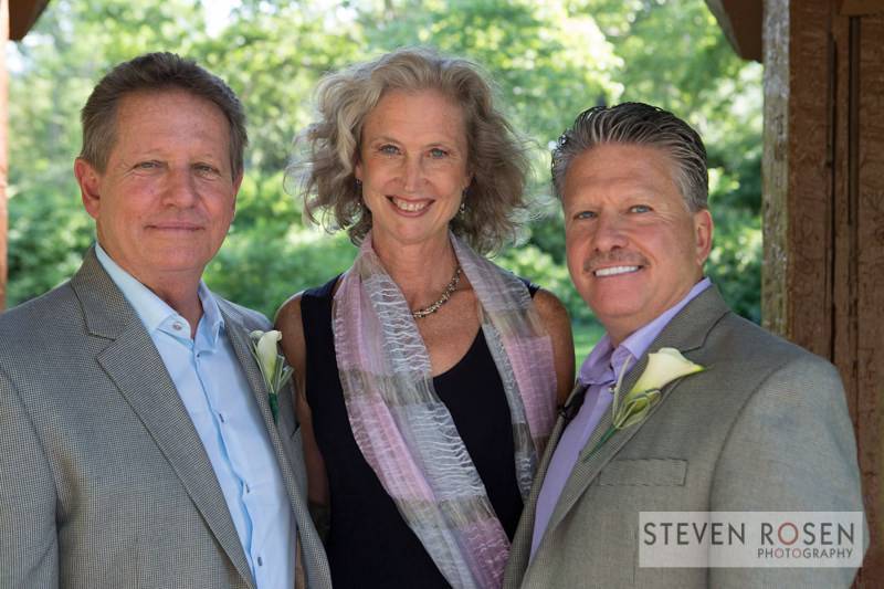 Couple with the officiant