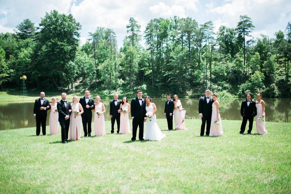 The couple with the bridesmaids and groomsmen