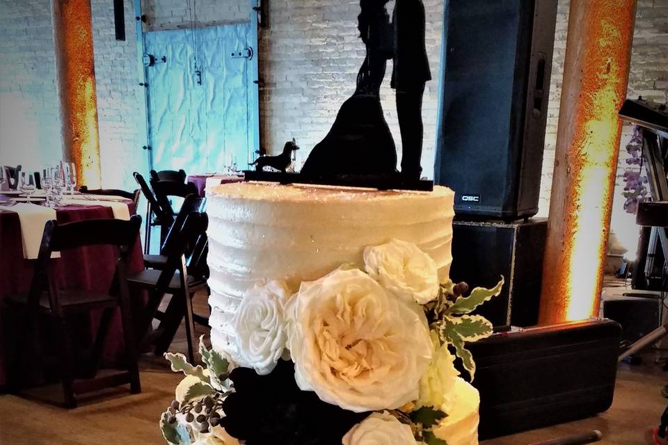 White cake with flower decorations