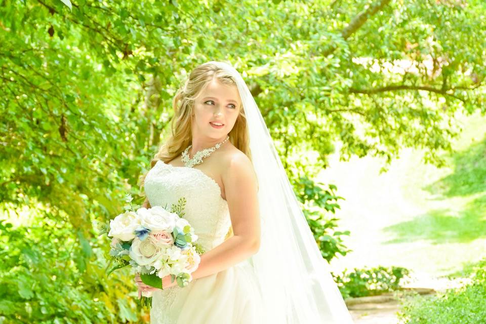 Bride in garden, St. Charles