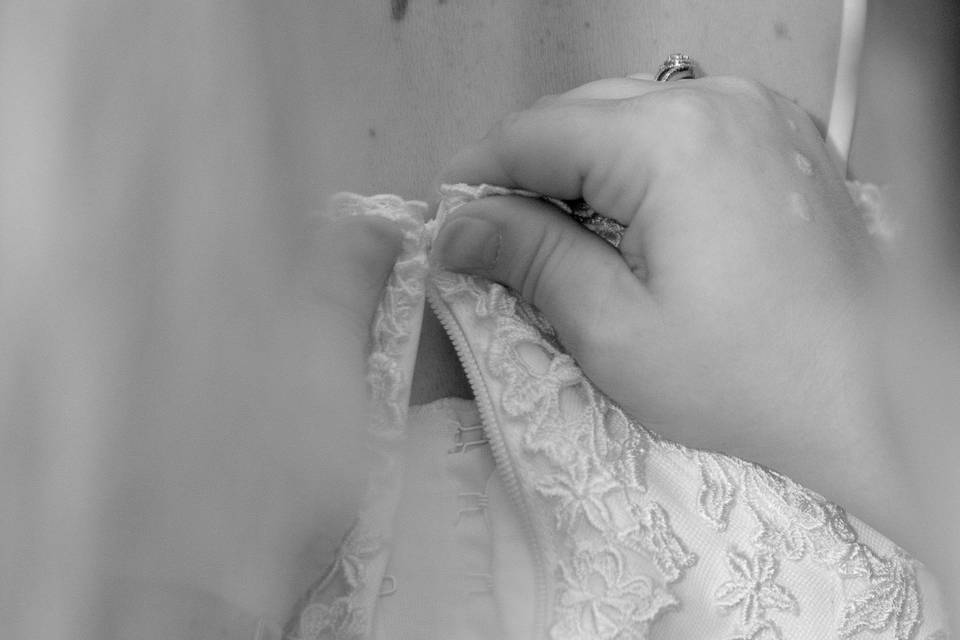Buttoning the Wedding Dress