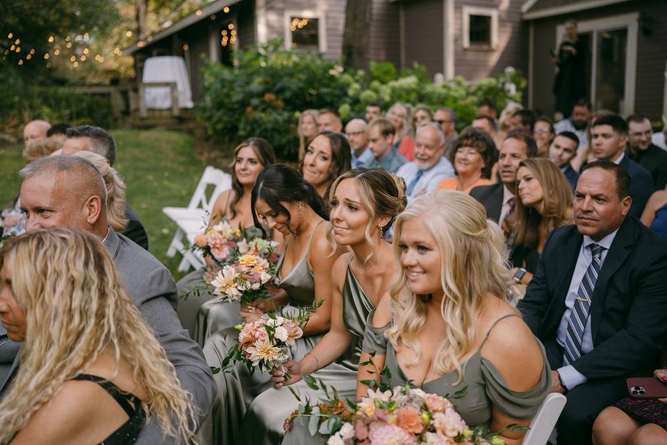 Bridal party watches ceremony