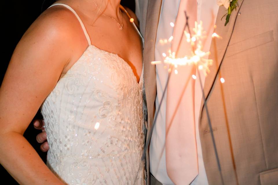 Bride and groom with sparkler