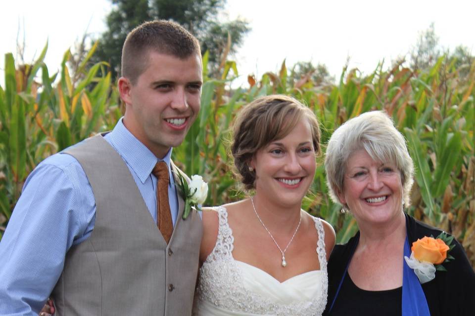 Couple with the officiant