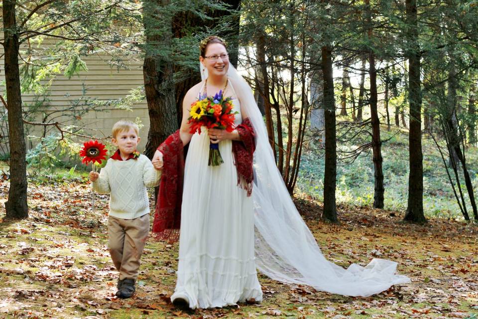 Bride escorted by her son