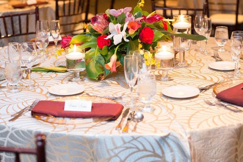 Table settings with floral centerpiece