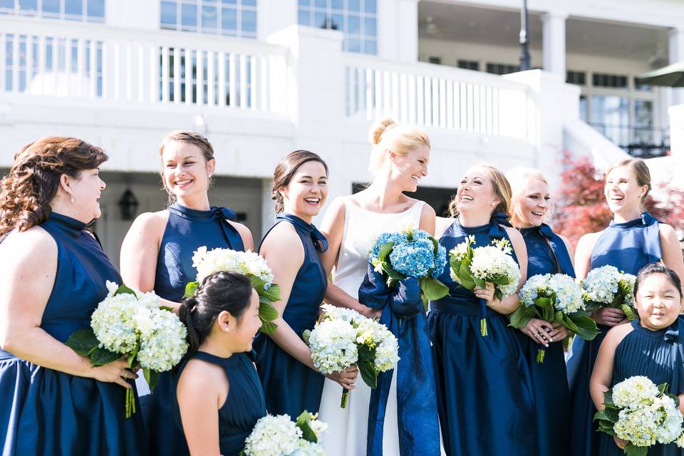 Bride, bridesmaids, and flower girls