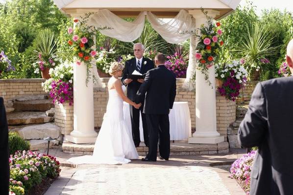 Wedding ceremony taking place outside