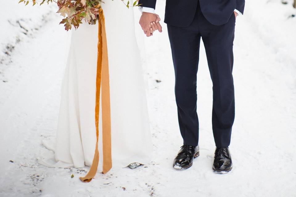 Bride and groom in the snow