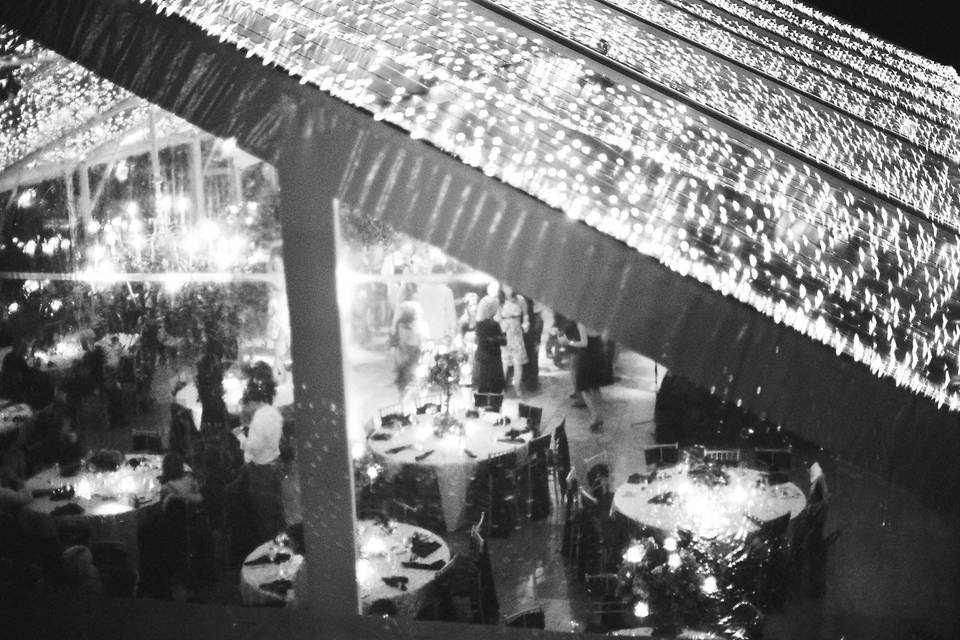 Spectacular tent reception dripping with string lights