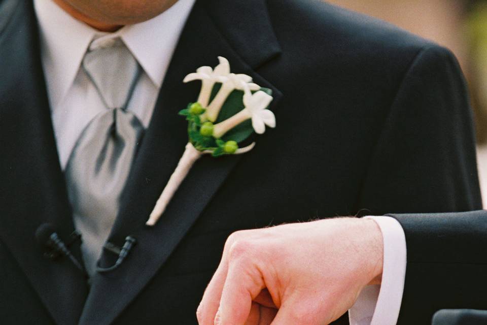 Groom receiving the rings