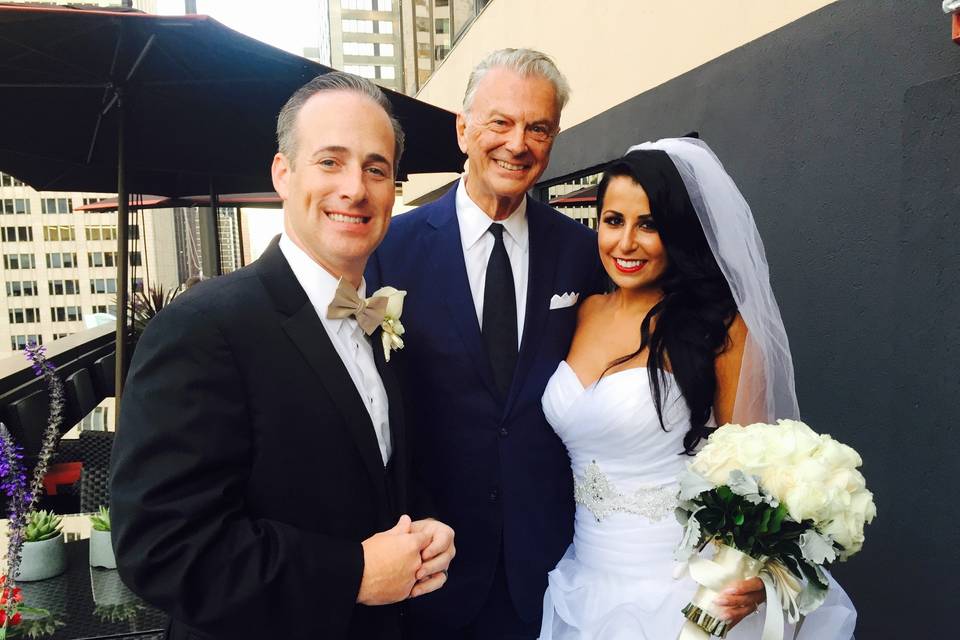 Newlyweds with the reverend
