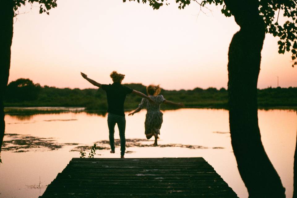 Jumping off dock into pond