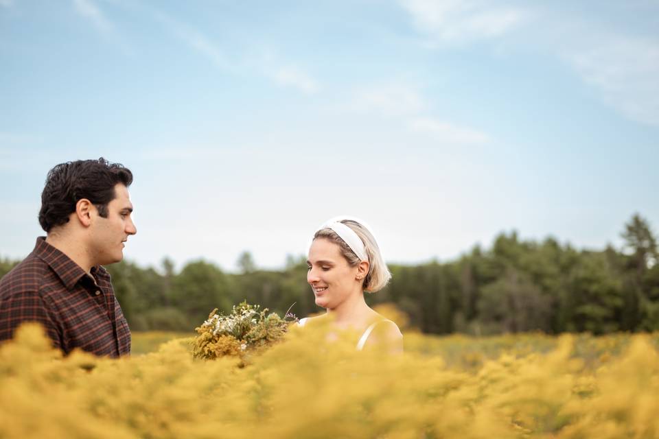 Elopement couple picks flowers