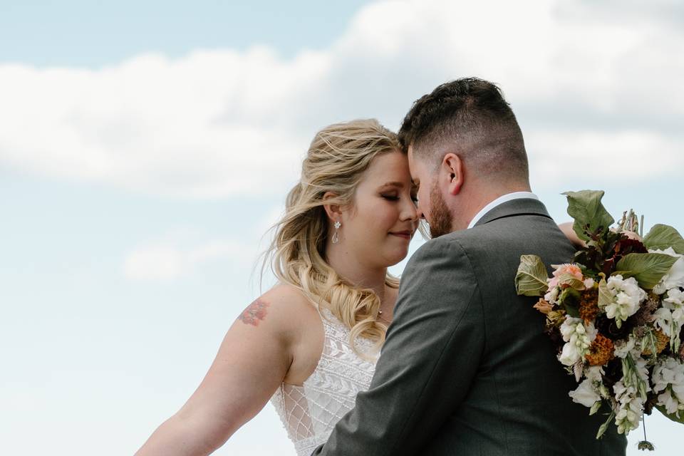 Bride and groom embrace