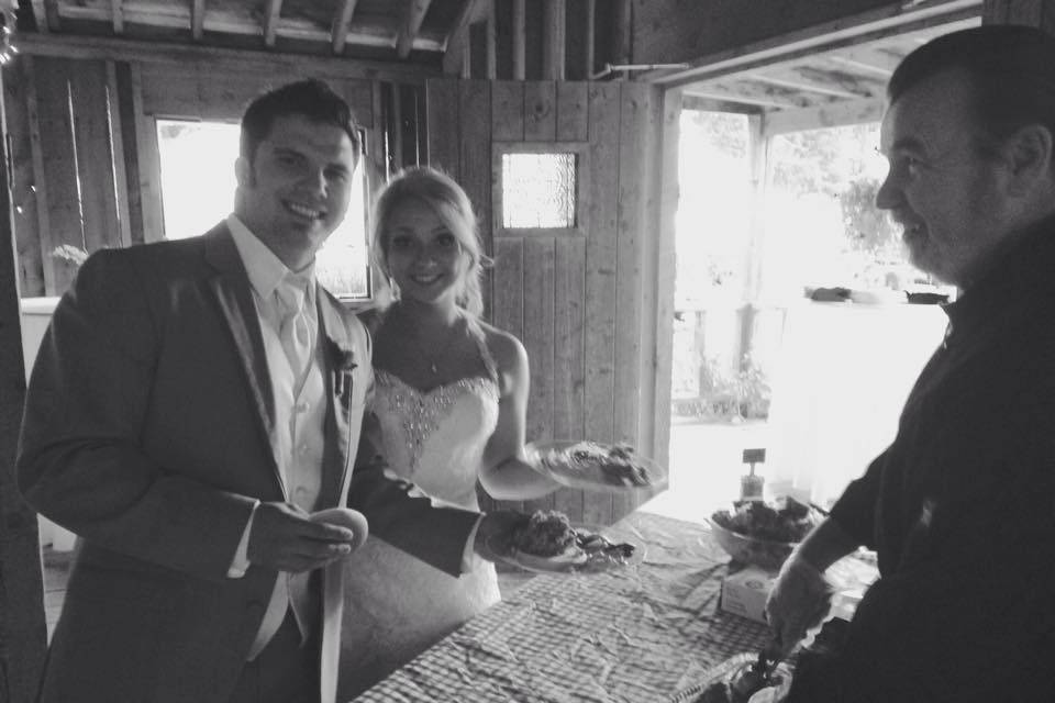 Our pit master Jack and a happy Bride and Groom!
