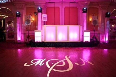 Monogram lights and pink uplighting