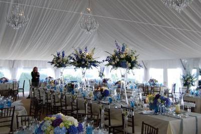 Inside a 20'x40' Navi-Trac frame tent with a clear tent top, Cafe String Lighting. Beach House Grille, Chatham Bars Inn. Wedding by Elegant Engagements.