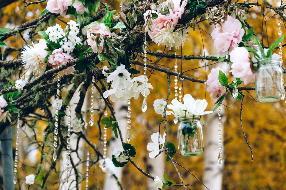 Suspended jars and wildflower installation