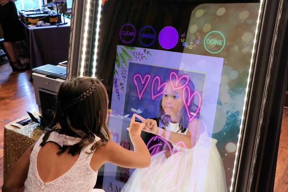 EMME touchscreen mirror booth